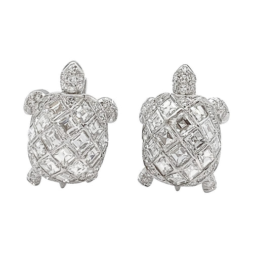 Boutons de manchette Boutons de manchette "Tortues" en platine, sertis de diamants. 58 Facettes 30067