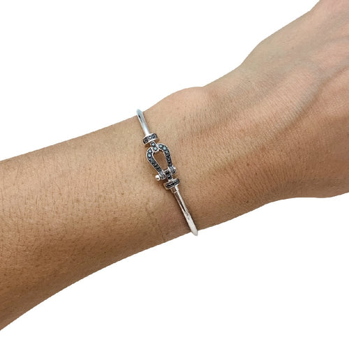 Bracelet Bracelet Fred "Force 10" moyen modèle en or blanc et diamants noirs. 58 Facettes 29903