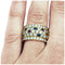 Bague 55 Bague Cartier, modèle Nigeria, en or jaune, diamants, rubis, saphirs et émeraudes. 58 Facettes 30384