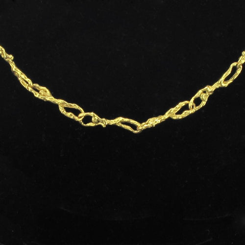 Collier Collier or personnages entrelacés 58 Facettes 12-037