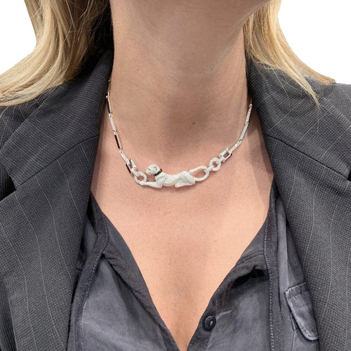 Collier Collier Cartier "Panthère" en or blanc, diamants, émeraude et onyx. 58 Facettes 29385