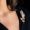 Broche Broche vintage bouquet or et diamants 58 Facettes 17-401