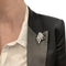 Broche Broche Chaumet "Volutes" en or blanc, diamants. 58 Facettes 30164