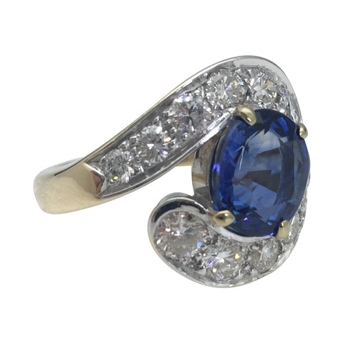 Bague 52 Bague Tourbillon en or jaune et blanc, saphir et diamants. 58 Facettes 28146