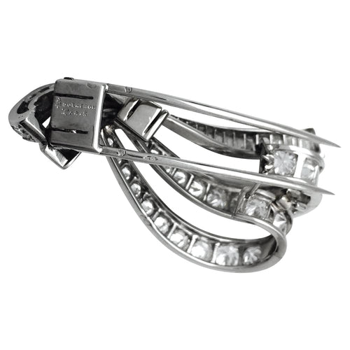 Clip Double clip Boucheron, "Noeud" en platine, or blanc et diamants. 58 Facettes 27909