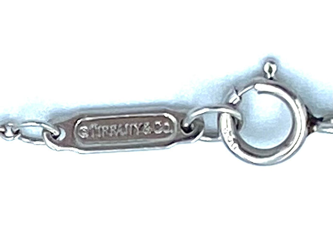 Collier TIFFANY & Co. Collier Open Circle en platine et diamants 58 Facettes
