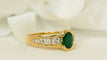 Bague 50 Bague en or jaune, émeraude ovale et diamants 58 Facettes F4834
