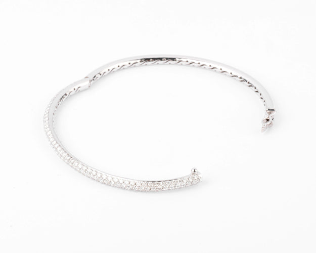 Bracelet Bracelet jonc en or gris serti de 3 lignes de diamant 58 Facettes