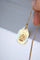 Pendentif Médaille or Art Déco Ange Penseur 58 Facettes
