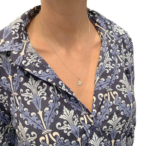 Collier Collier et pendentif Dodo "Trèfle" en or blanc et diamants. 58 Facettes 31734