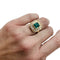 Bague 48 Bague en or jaune, émeraude et diamants. 58 Facettes 30985