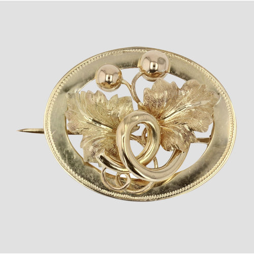 Broche Broche ancienne en or à décor de feuille de vigne 58 Facettes 13-052B