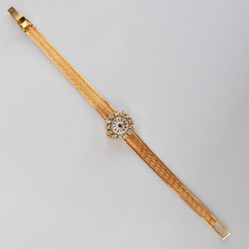 Montre Montre or jaune diamants de dame 58 Facettes 22-413