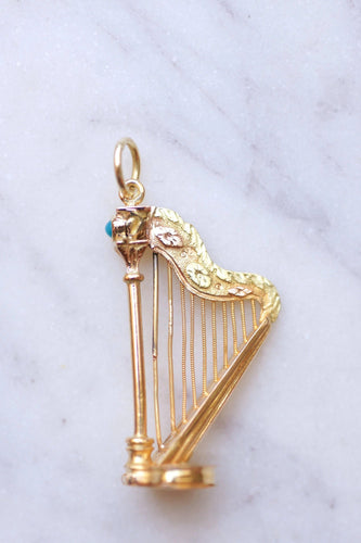 Pendentif Pendentif Victorien Harpe en or jaune et turquoise à compartiment secret 58 Facettes