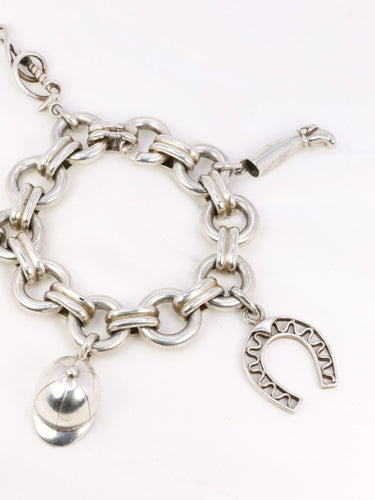 Bracelet Gaétan de Percin (attribué à HERMES) - Bracelet en argent et breloques thème hippique 58 Facettes 896
