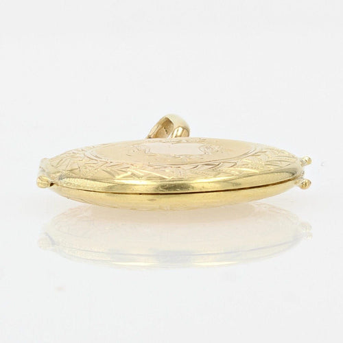 Pendentif Médaillon ancien en or jaune ciselé 58 Facettes 21-809