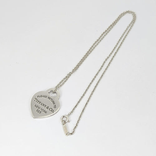 Pendentif TIFFANY & CO - Pendentif  "Please return to" argent 58 Facettes 25394
