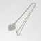 Pendentif TIFFANY & CO - Pendentif  "Please return to" argent 58 Facettes 25394