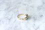 Bague Bague jarretière diamants et émeraudes 58 Facettes