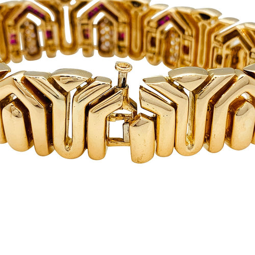 Bracelet Bracelet Boucheron en or jaune, rubis et diamants. 58 Facettes 31013