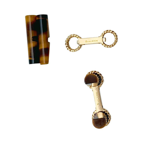 Boutons de manchette Boutons de manchette Boucheron en or jaune et oeil de tigre . 58 Facettes 31495