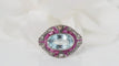 Bague Bague Art Déco or blanc et argent, aigue marine, rubis et diamants 58 Facettes 31442