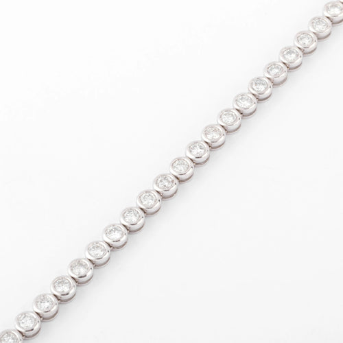 Bracelet Bracelet en or gris et diamants tennis serti tennis 58 Facettes 1