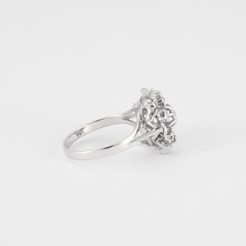 Bague 51 Bague "fleur" or blanc et diamants 58 Facettes P10L5