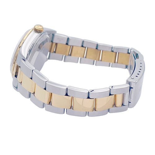 Montre Montre Rolex "Oyster Perpetual" en or jaune et acier. 58 Facettes 32835