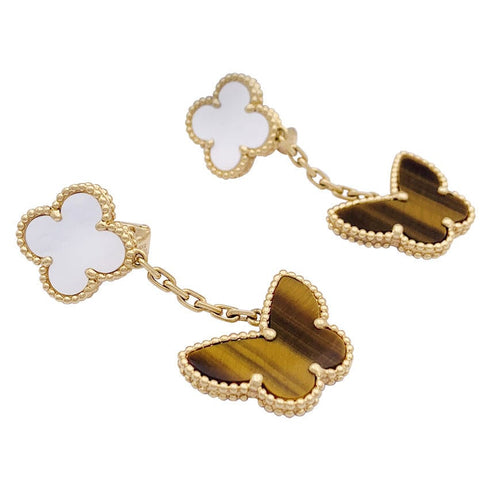 Boucles d'oreilles Boucles d'oreilles Van Cleef & Arpels "Lucky Alhambra" or jaune, nacre blanche, oeil de tigre. 58 Facettes 33555
