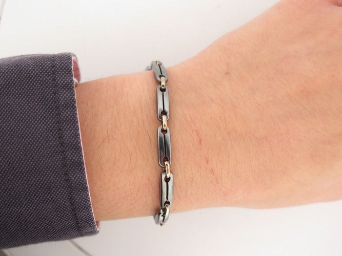 Bracelet vintage bracelet CARTIER a maillons 19 or jaune 18k hematite 58 Facettes 258414