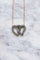 Collier Collier ancien double cœur perles 58 Facettes