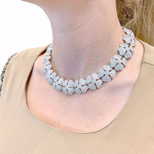 Collier Collier Cartier "Clover" or blanc et diamants. 58 Facettes 31542