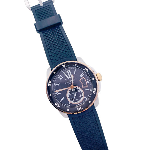 Montre Montre Cartier Calibre en or et acier sur bracelet caoutchouc. 58 Facettes 32552