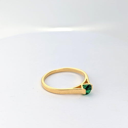 Bague Bague en or jaune et Emeraude 58 Facettes 21153