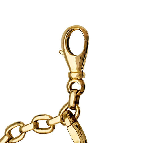 Bracelet Bracelet Cartier en or jaune, 6 breloques, diamants, émeraudes et rubis. 58 Facettes 30849/55