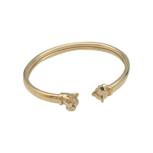 Bracelet Bracelet Cartier "Panthère" en or jaune, tsavorites et onyx. 58 Facettes 31325
