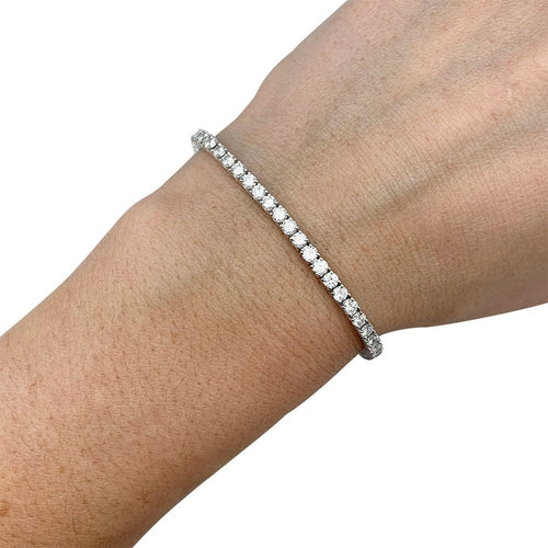 Bracelet Ligne tennis Gubelin or blanc diamants. 58 Facettes 30975