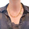 Collier Collier Pomellato "Sabbia" en or rose et diamants bruns. 58 Facettes 31399