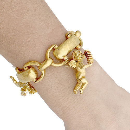 Bracelet Bracelet vintage, "Chérubins Musiciens", or jaune. 58 Facettes 33341