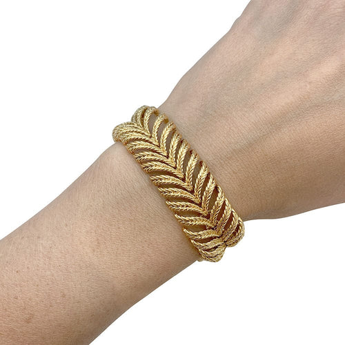 Bracelet Bracelet Boucheron "Plume" en or jaune. 58 Facettes 31481