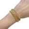 Bracelet Bracelet Boucheron "Plume" en or jaune. 58 Facettes 31481