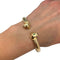 Bracelet Bracelet Cartier "Panthère" en or jaune, tsavorites et onyx. 58 Facettes 31325