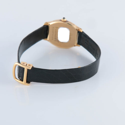 Montre Montre Cartier or jaune modèle tortue 58 Facettes