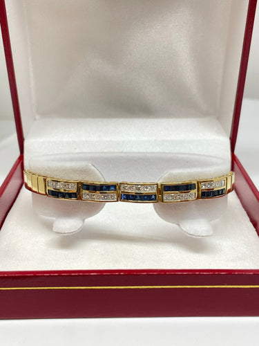 Bracelet Bracelet femme en or jaune diamants et saphirs 58 Facettes