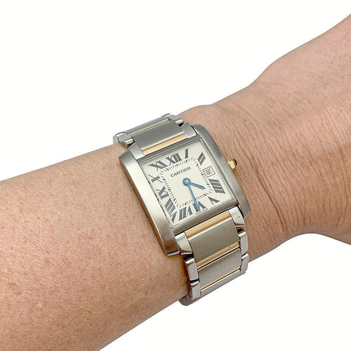 Montre Montre Cartier modèle Tank Française moyen modèle en or et acier. 58 Facettes 31444