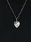 Pendentif Médaille amour Augis cœur Or blanc Rubis Plus qu’hier moins que demain 58 Facettes J238