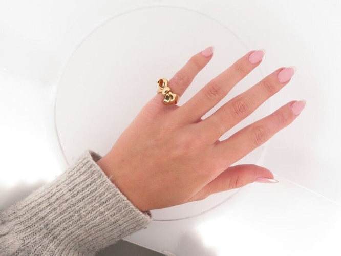 Bague 49 bague CHRISTIAN DIOR noeud en or jaune 18k 58 Facettes 257221