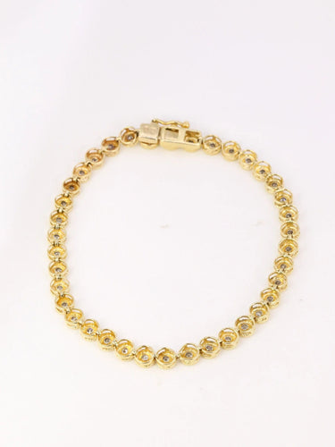 Bracelet Bracelet tennis vintage or jaune et diamants en serti clos 58 Facettes J92