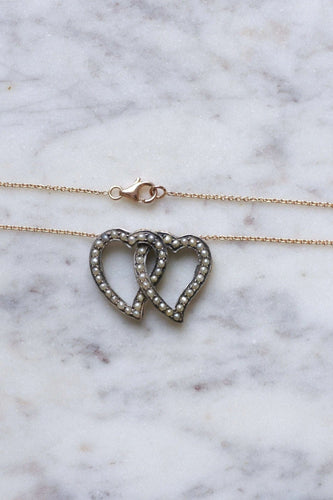 Collier Collier ancien double cœur perles 58 Facettes